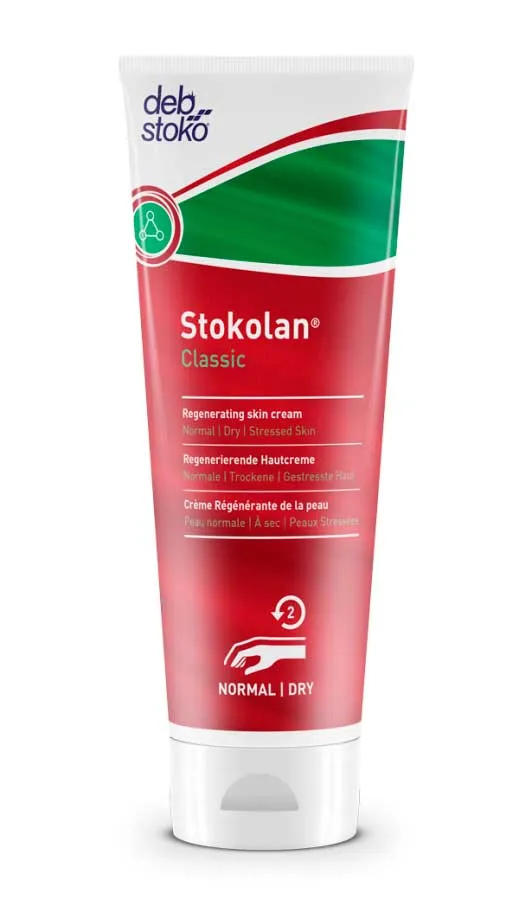 Nutricion de la piel. Marca STOKOLAN®. Crema para el cuidado de manos y cara, regeneradora de la piel de rapida absorcion. Medianamente grasa. Exenta de silicona. Adecuada para pieles secas. Previene la dermatosis profesional. Perfumado. Vol. 100ml. Envas