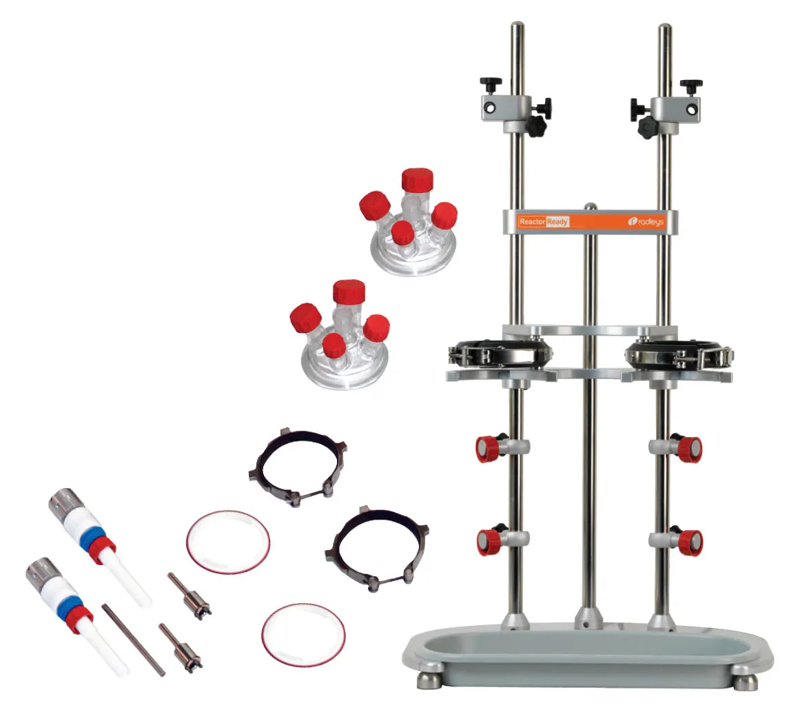 Sistema Reactor-Ready Duo Core. RADLEYS. Incluye: Soporte Duo base, bandeja de desagüe, varillas soporte y pinzas. 2 Guias de agitación PTFE y conexiones. 2 Tapas del recator de vidrio con conexiones Rodaviss. 2 Juntas de FEP para recator y 2 sellos centrales de PTFE. 2 Collares-soporte de acero inox. Reactor-Ready™ Flex